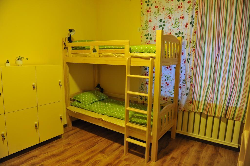 Dalian Buzz Light Year Youth Hostel Quarto foto